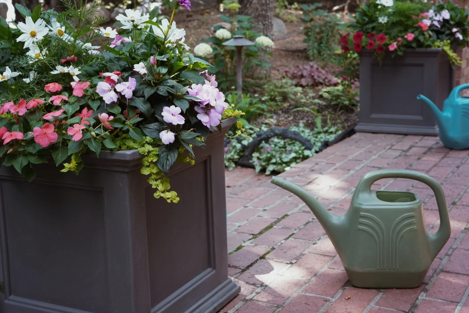 Custom container gardens on a patio and terrace