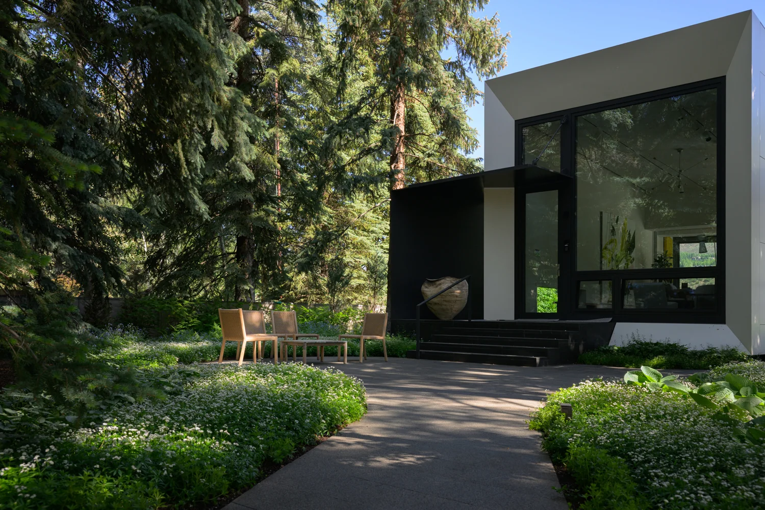 Residential landscape with layered plantings at a private mountain home in the Roaring Fork Valley